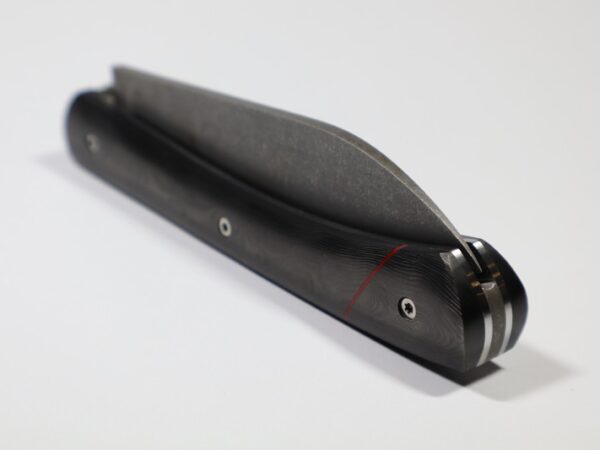 Le-Tarn-carbone-Black-Mountain-lisere-rouge-lame-Stonewash-IMG_0390.jpg